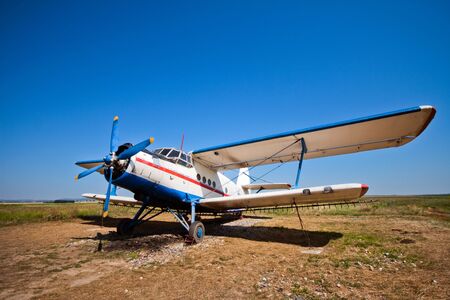 airpcraft used for pesticide spreading parked on groundの写真素材