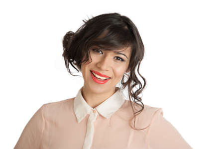 Portrait of a beautiful brunette in a pink blouse 