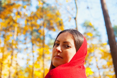 Fashionable young woman enjoying in autumn seasonの写真素材