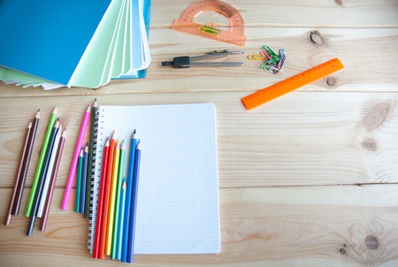 many school supplies are a bunch on the table
