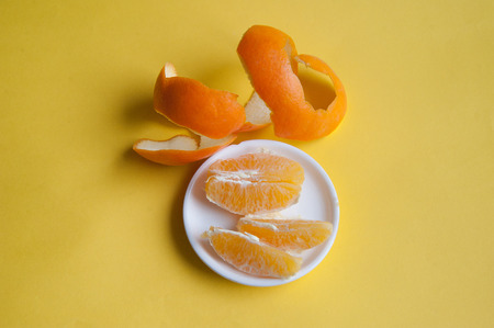 citrus fruits on a yellow backgroundの写真素材