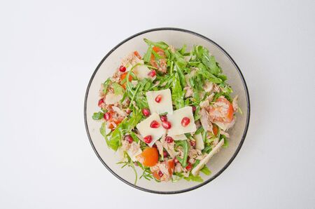 pomegranate salad in transparent dishの写真素材