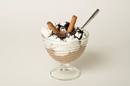 chocolate ice cream with whipped creamの写真素材