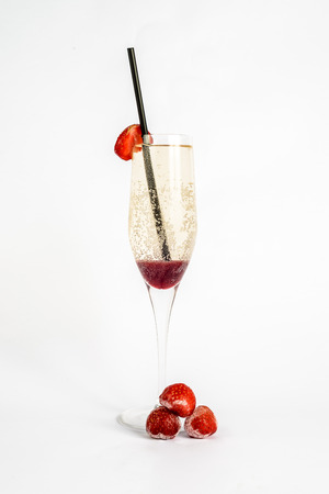 champagne and strawberries with fruitsの写真素材
