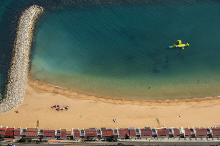 Beautiful beach and the blue sea seen from aboveの写真素材