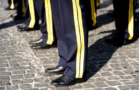 Legs only of army orchestra members performing on a military paradeの写真素材