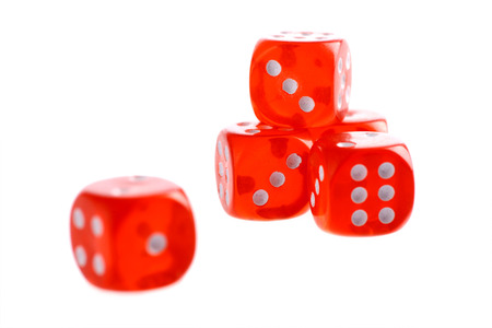 Fice used red dices studio shot isolated on white