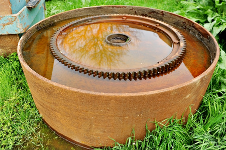 Detail with big rusty industrial sprocket wheelの写真素材