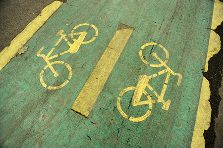 Detail with a deteriorated bicycle lane