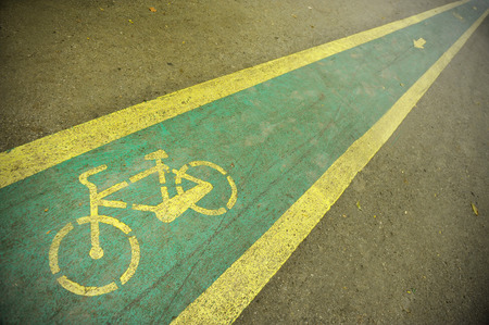 Detail with a bicycle lane in the parkの写真素材