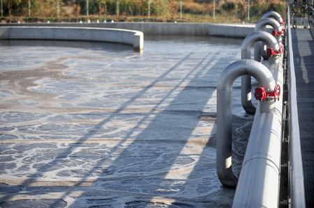 Industrial scene with a modern waste water treatment plantの写真素材