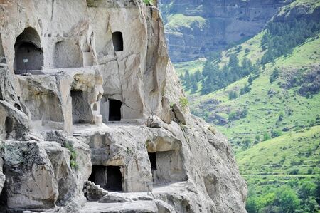 Detail with Vardzia ancient cave city on a summer day. Vardzia is one of the main landmarks in Georgia.の写真素材