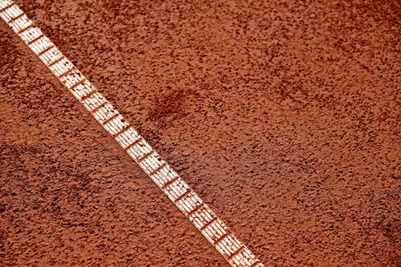 Detail with sideline and moisture on a tennis clay courtの写真素材