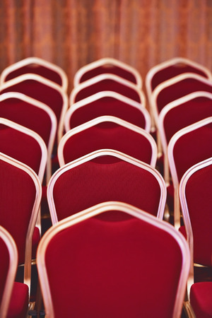 Vintage shot of empty chairs in a meeting and events roomの写真素材