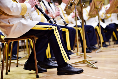 Detail with military orchestra uniform during a concertの写真素材