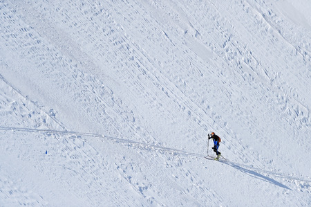 FAGARAS, ROMANIA - MARCH 5: Ski mountaineer competes during the Ski Mountaineering National Competition in Fagaras Mountains, Carpathian Range, on March 5, 2016 in Romania.のeditorial素材
