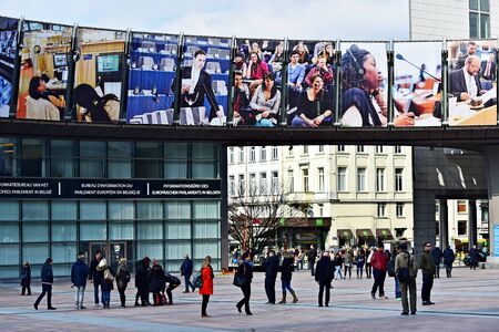 BRUSSELS, BELGIUM - MARCH 16: Wide angle shot with people walking by European Parliament's Leopold...