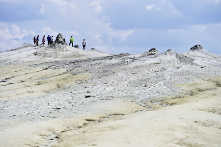 BERCA, ROMANIA - JULY 2: Tourists visiting the mud active volcanoes in Berca on June 2, 2016 in Romaniaのeditorial素材