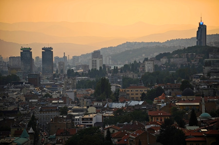 Sarajevo city panoramic shot from a hill at sunsetの写真素材