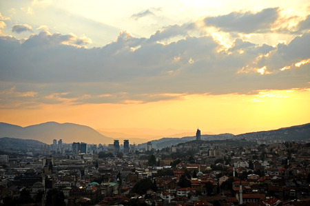 Sarajevo city panoramic shot from a hill at sunsetの写真素材