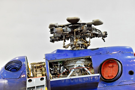 Detail with helicopter fuselage on the repair line in a factory