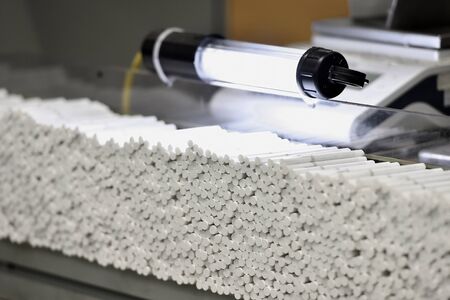 Cigarettes production process inside a modern factoryの写真素材