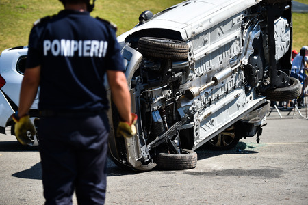 Scene of a car crash and emergency rescue service in actionの写真素材