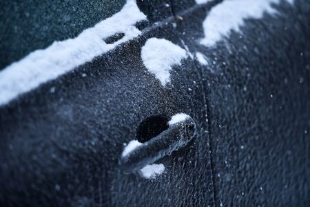 Car covered in ice during freezing rain phenomenonの写真素材