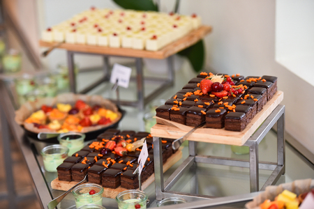 Catering service with delicious deserts and fruit tartsの写真素材