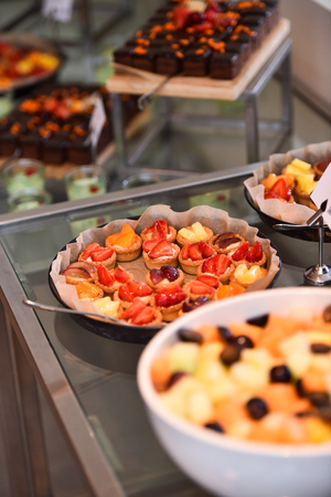 Catering service with delicious deserts and fruit tartsの写真素材