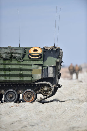 Amphibious tank caterpillars are seen on a beach in the sandの写真素材