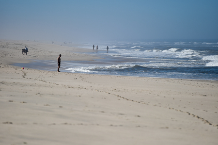 Sunny day scene at the beach on the shoreline of Atlantic Oceanの写真素材