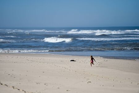 MONTE REAL, PORTUGAL - SEPTEMBER 28, 2016: Sunny day scene at the beach on the shoreline of Atlantic Ocean.のeditorial素材
