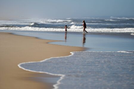 MONTE REAL, PORTUGAL - SEPTEMBER 28, 2016: Sunny day scene at the beach on the shoreline of Atlantic Ocean.のeditorial素材
