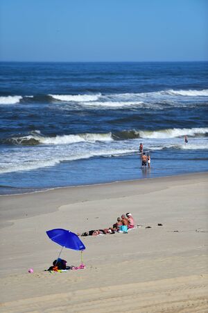 MONTE REAL, PORTUGAL - SEPTEMBER 28, 2016: Sunny day scene at the beach on the shoreline of Atlantic Ocean.のeditorial素材
