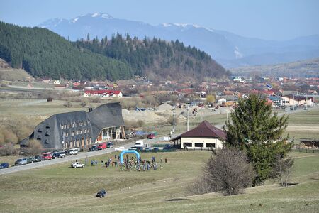 ZARNESTI, ROMANIA - MARCH 30, 2019: Athletes compete during a spring ski touring and trail running competition in Piatra Craiului mountains.のeditorial素材