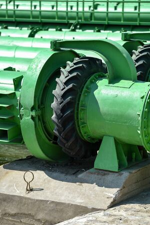 Industrial pipes used to pump water from a river to irrigate drought fieldsの写真素材