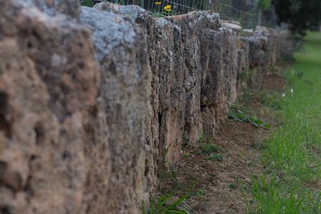 Stone rural old wall.