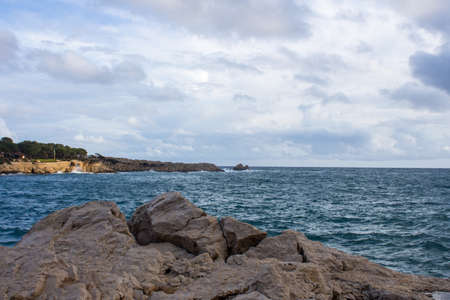 Stormy Mediterranean sea at the coast of Cala Ratjada, Mallorca, Spain.の写真素材