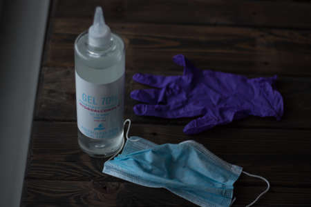 Hand sanitizer (hydroalcoholic gel), face masc and gloves. Coronavirus Covid 19 protection (disinfection).の写真素材