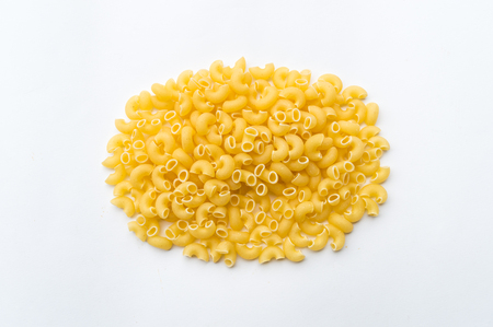 Pasta macaroni elbows isolated on white backgroundの写真素材