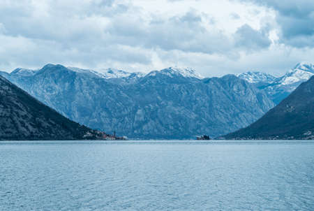 The scenic view on the mountains, surrounding the Kotor bay amd Perast with islands