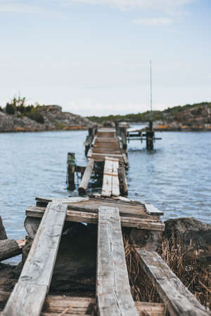 Wooden pier on the lake. Old wooden pier on a lake.の写真素材