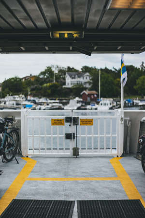Parking for bicycles at the entrance to the car park.の写真素材