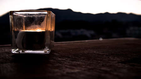 Candlelight and mountain backgroundの写真素材