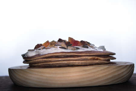 Pancakes on a luminous white background