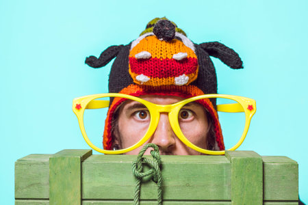 Funny picture of a man. With hat and glassesの写真素材