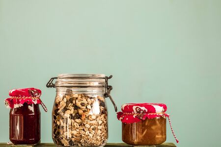 Jam cans on a blue background. Vintage concept