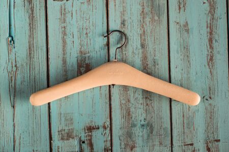 Hangers for clothes on rustic background. Fashion conceptの写真素材