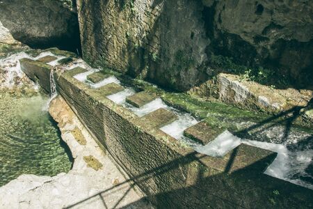 Roman water pipe in a river. Natureの写真素材